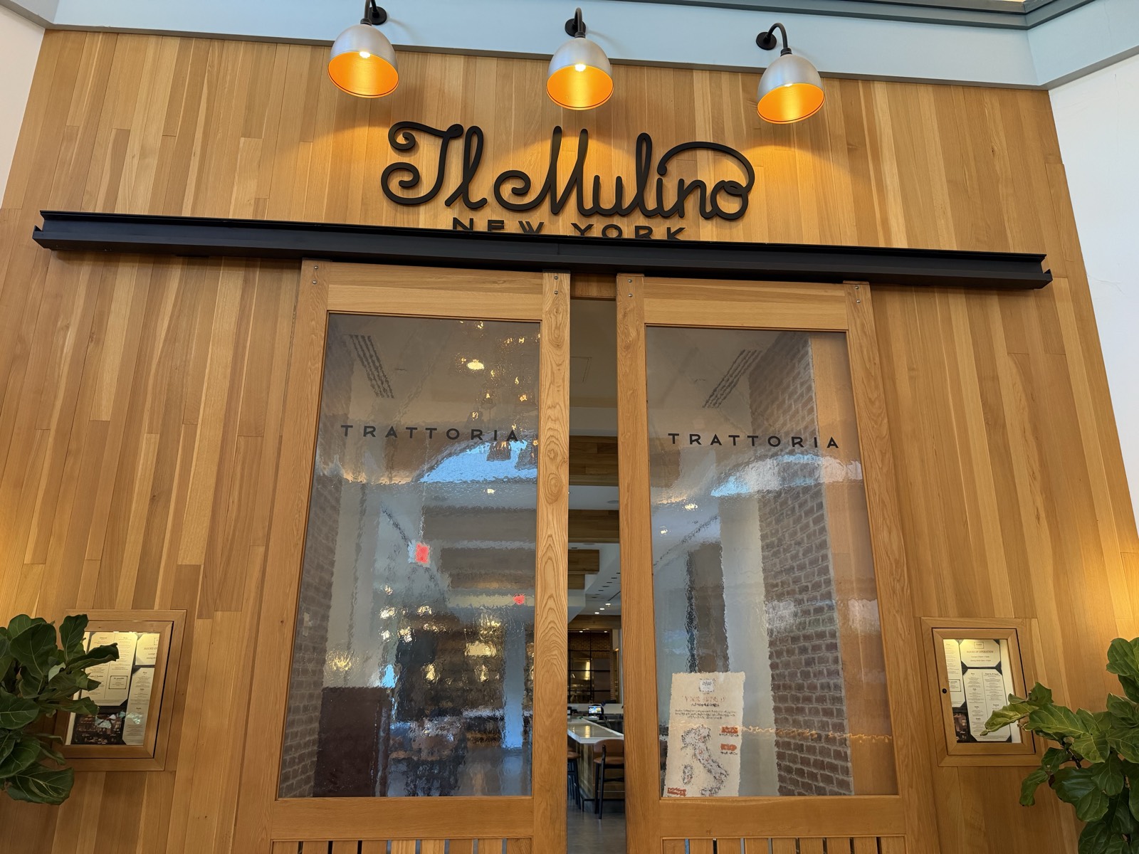 Entrance to Il Mulino New York Trattoria inside the Walt Disney World Swan